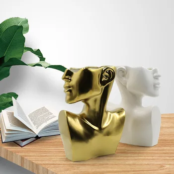 Minimalistický portrét váza keramická plastika poprsí tvář lidské hlavy umění aranžování květin skladovací plochy bytové dekorace ozdoby